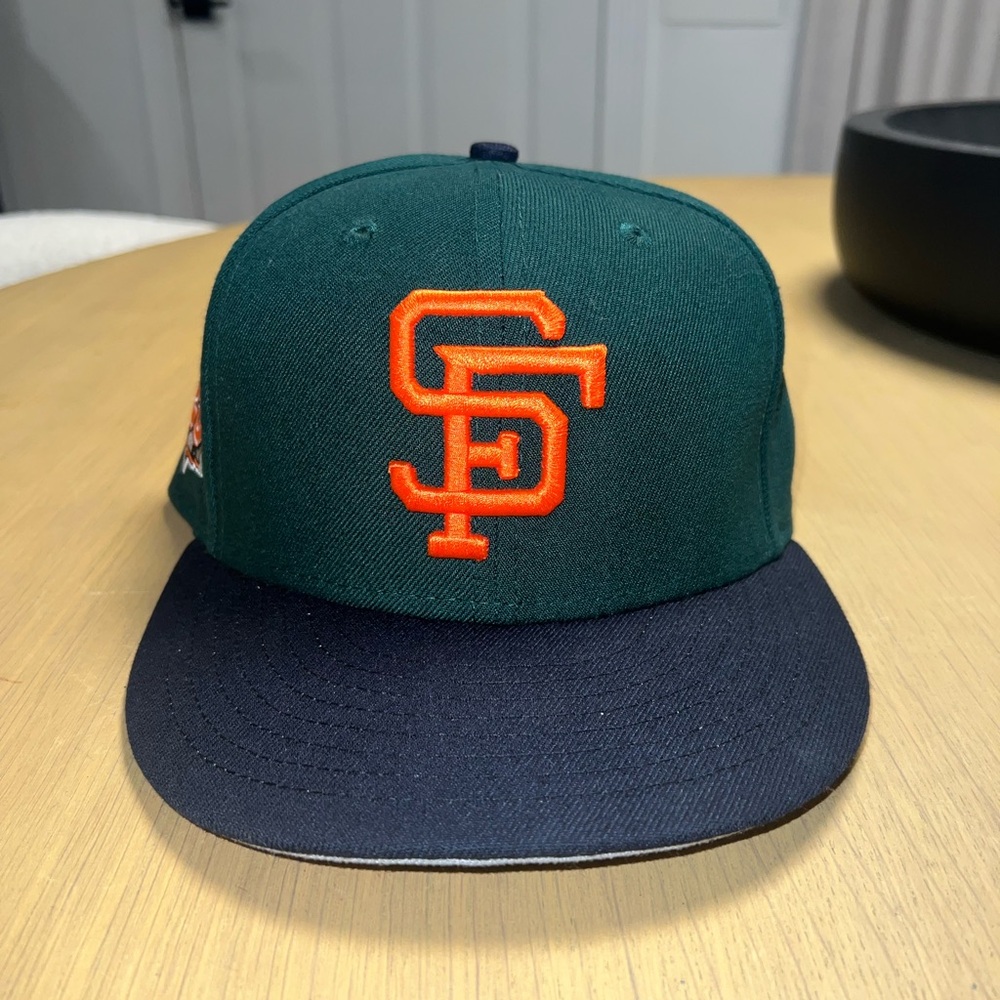 New Era Green and Navy Cap with Orange Logo